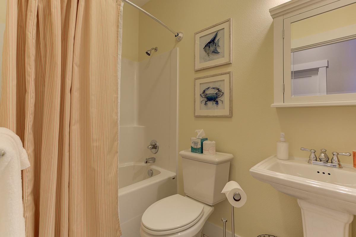 The shared bathroom tub is perfect for a relaxing soak