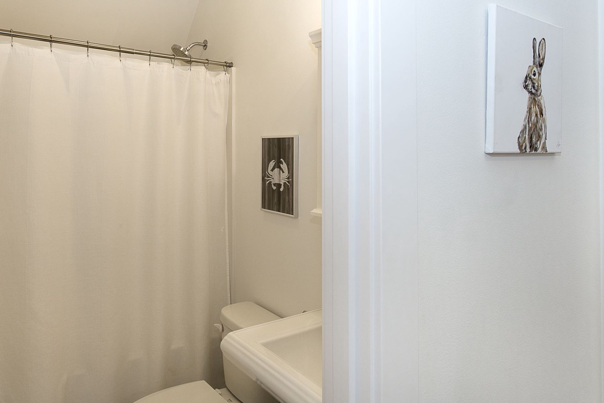 Master bathroom with combination shower and tub