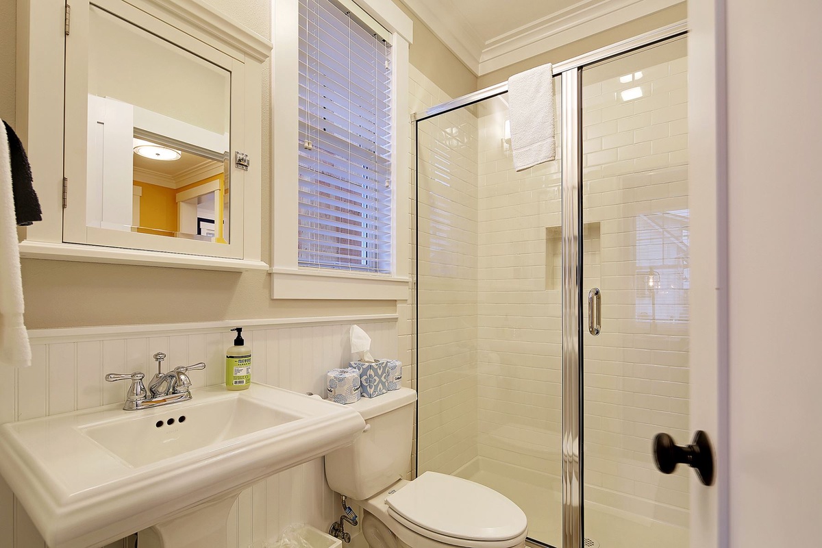 Primary ensuite bathroom also has entry to mudroom