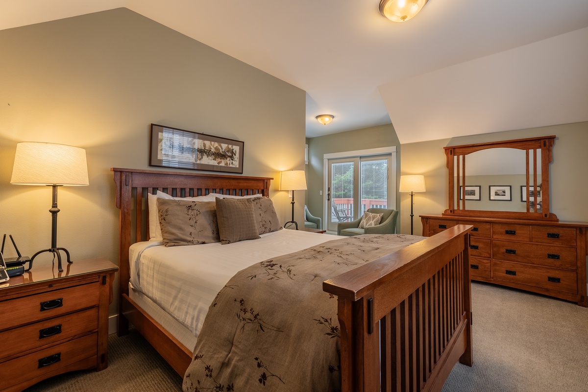 The spacious primary bedroom offers comfort, style and relaxation