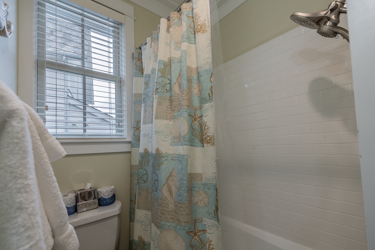 Guest bathroom with tub