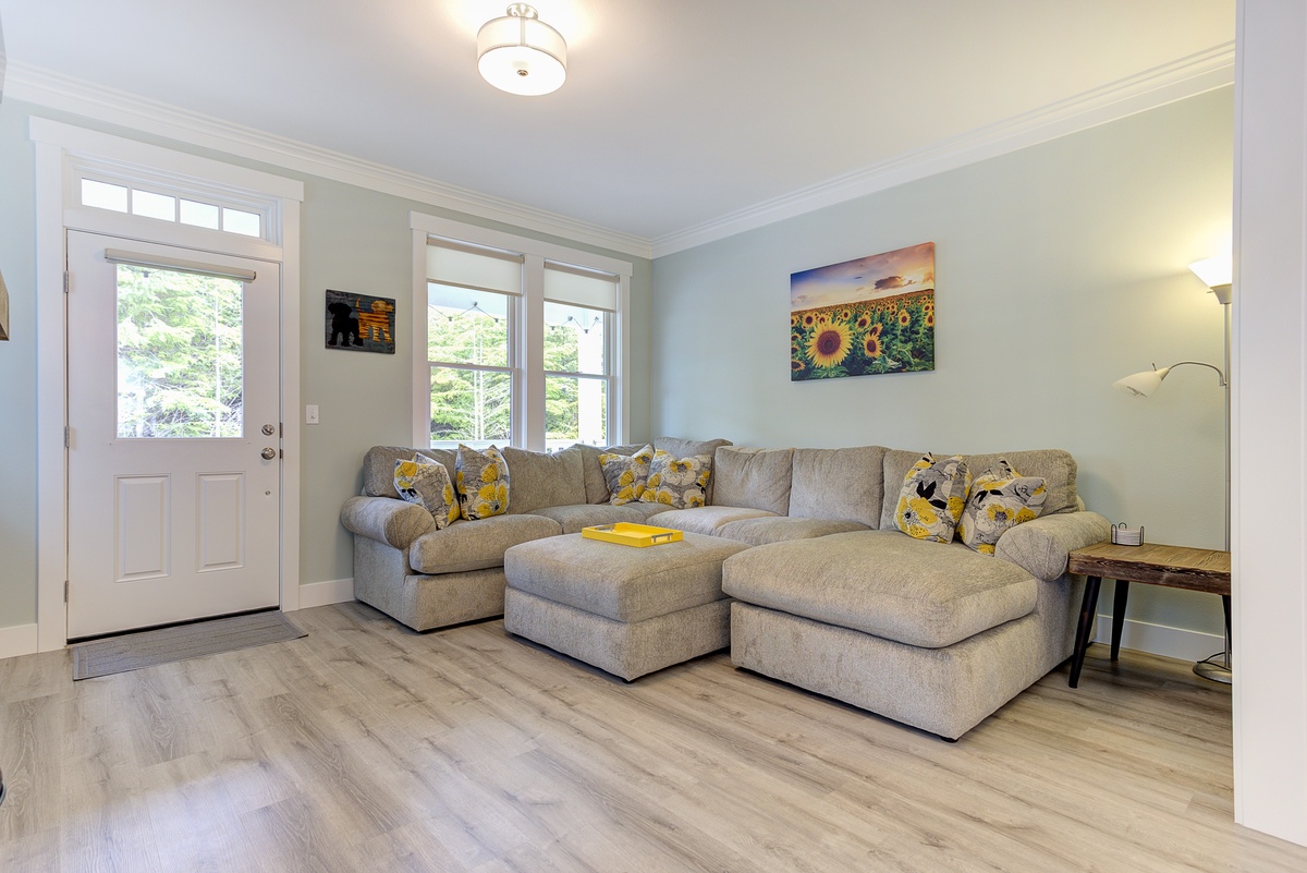 The living room leads out to the front porch