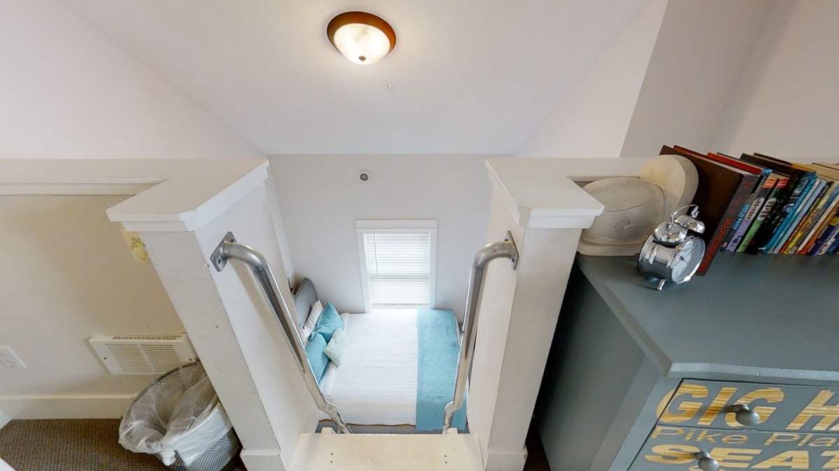 View of queen bedroom from the loft