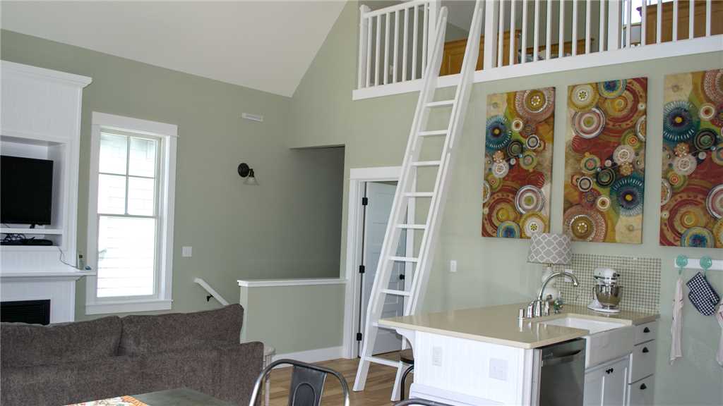 Second floor loft ladder leading up to the loft bedroom