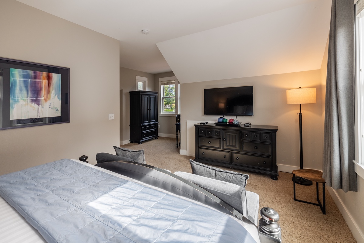 The primary bedroom is designed for restful nights and peaceful mornings