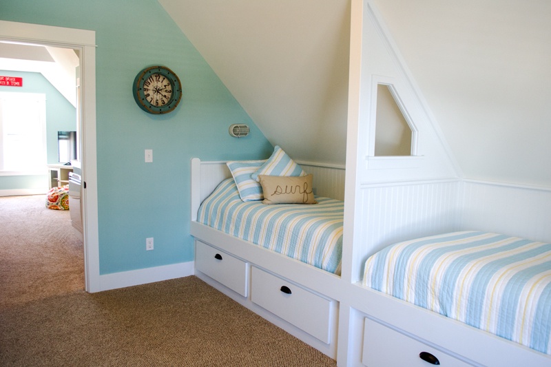 Third floor built in bunk beds, four twin beds, one of which is a trundle