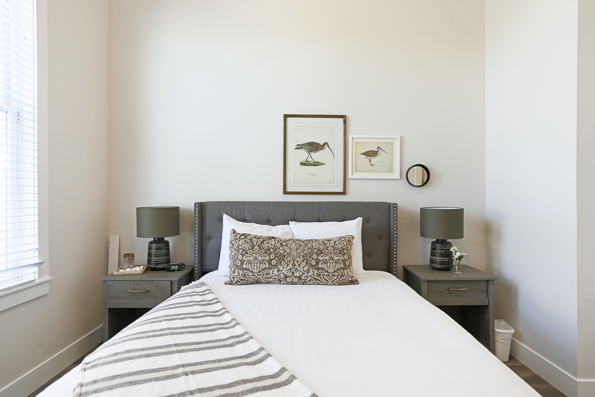 Charming shorebird artwork in guest bedroom