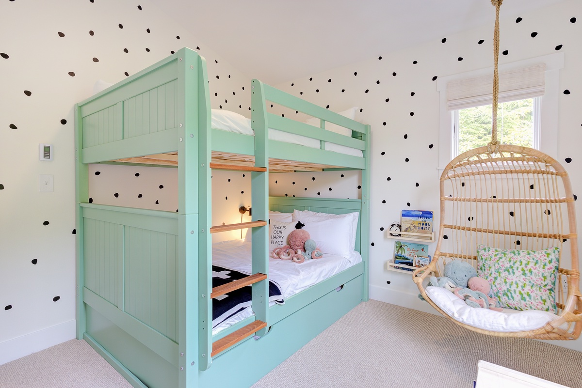 guest bunk bedroom with a twin trundle