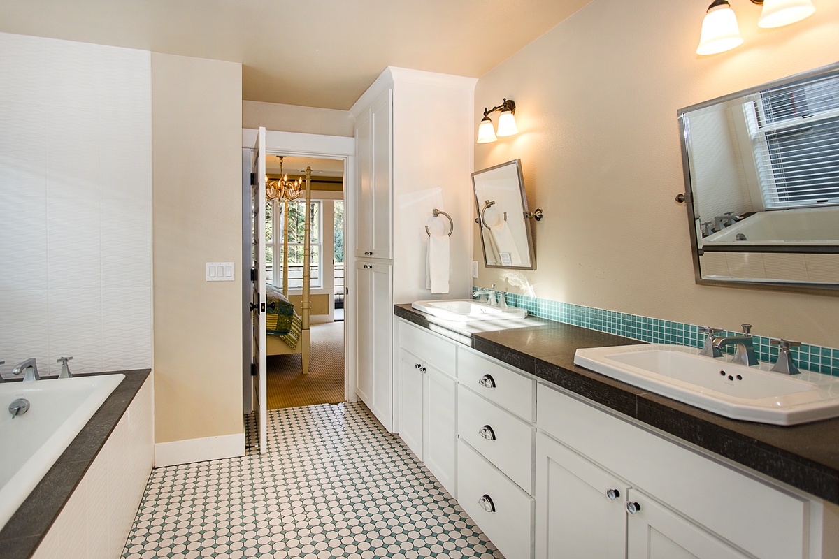 Second Floor - Primary King Suite bathroom with large soaking tub and shower