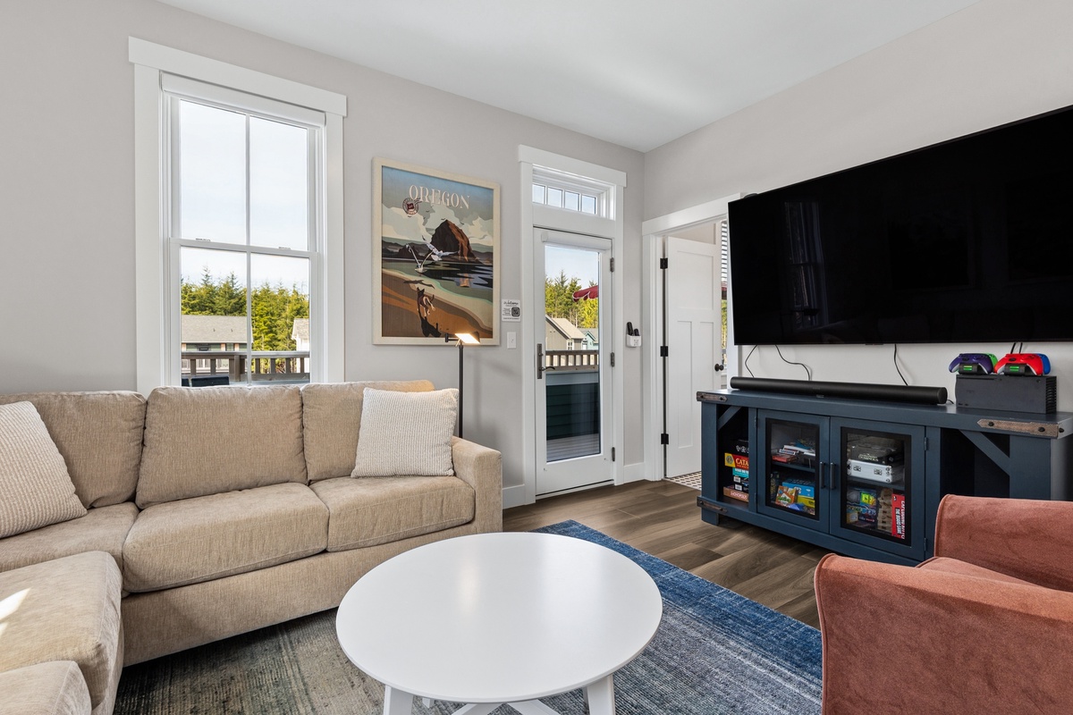 Media room with attached full bathroom