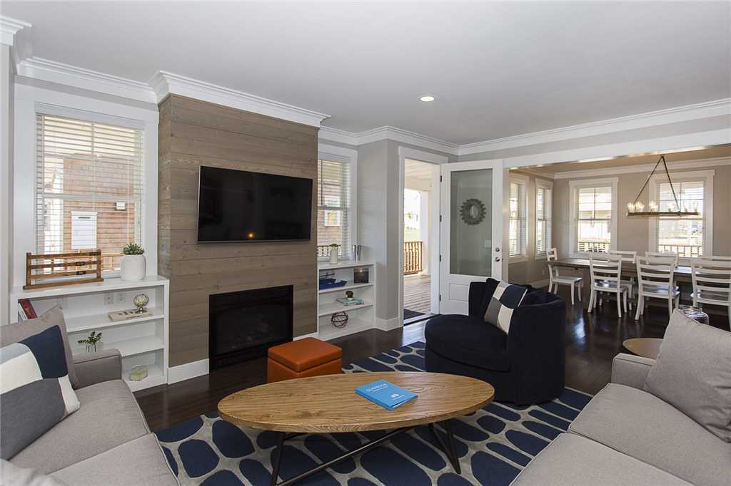 Living room with gas fireplace and 55-inch TV