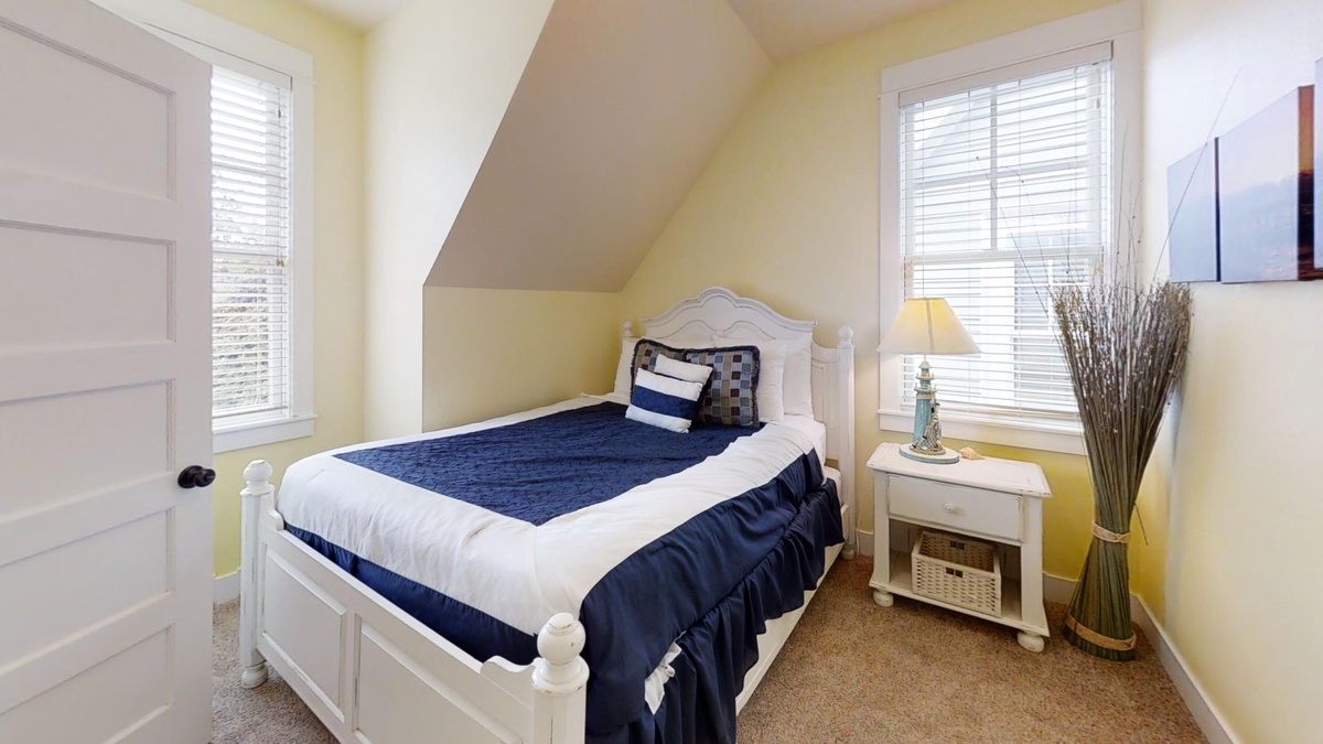The queen bed in the carriage house is cozy and comfortable