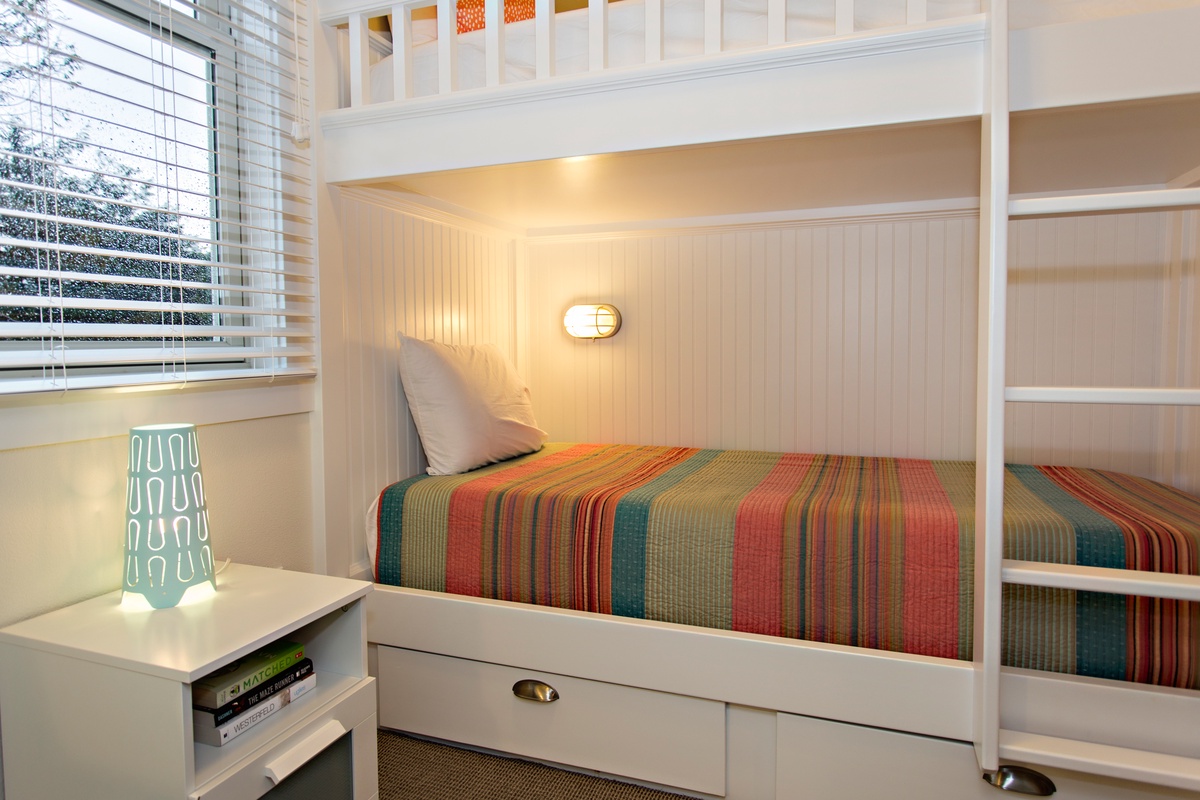Private lighting for each bed makes reading at night easy