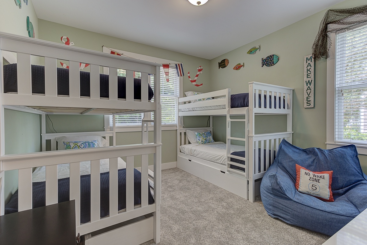 The fun bunkroom sleeps four in twin beds