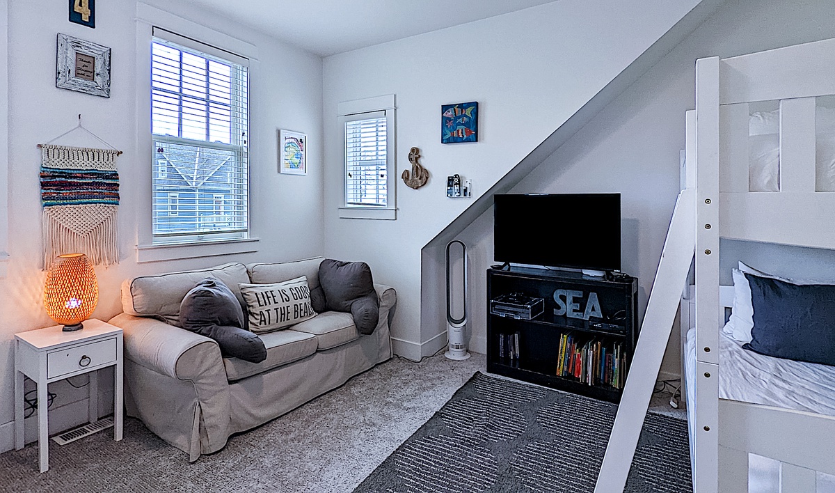 Media room with two sets of bunk beds