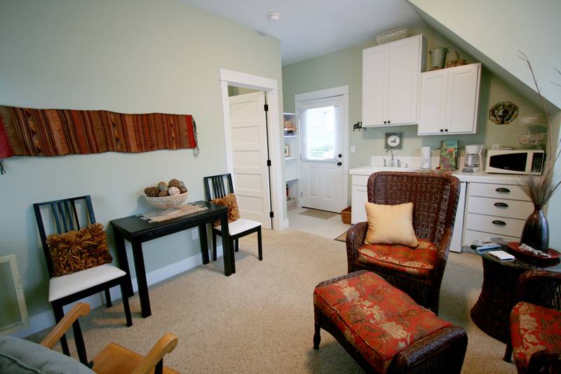 Carriage house kitchenette with microwave, mini fridge, coffee pot and electic kettle