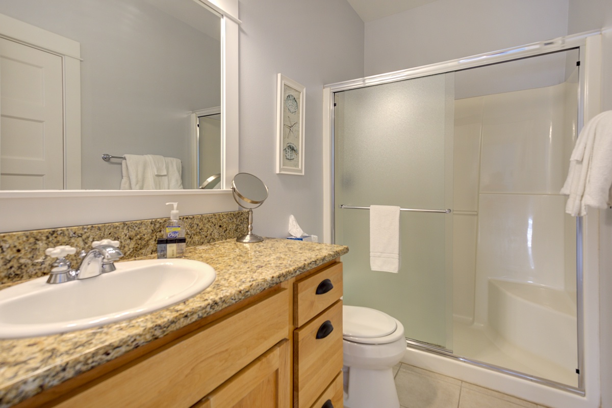 The shared bathroom is designed for comfort and ease during your stay