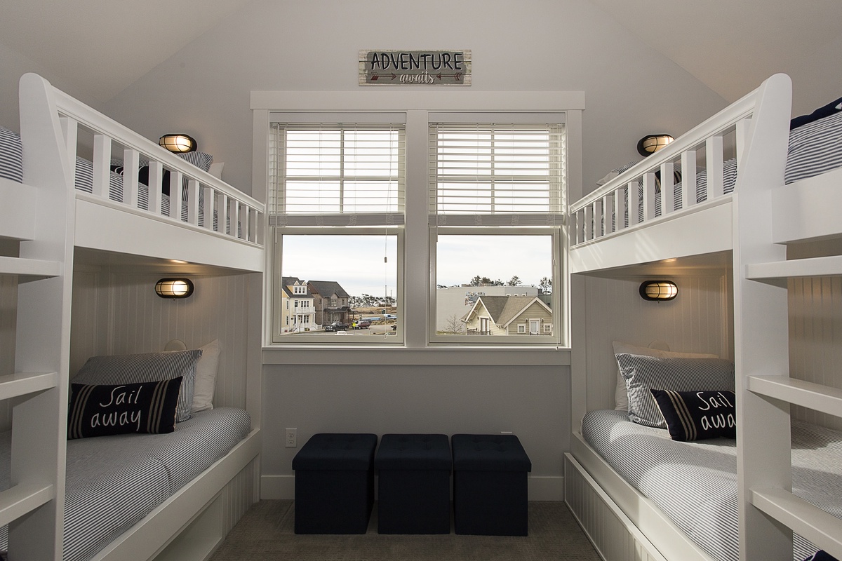 Third floor bunk room with a trundle bed