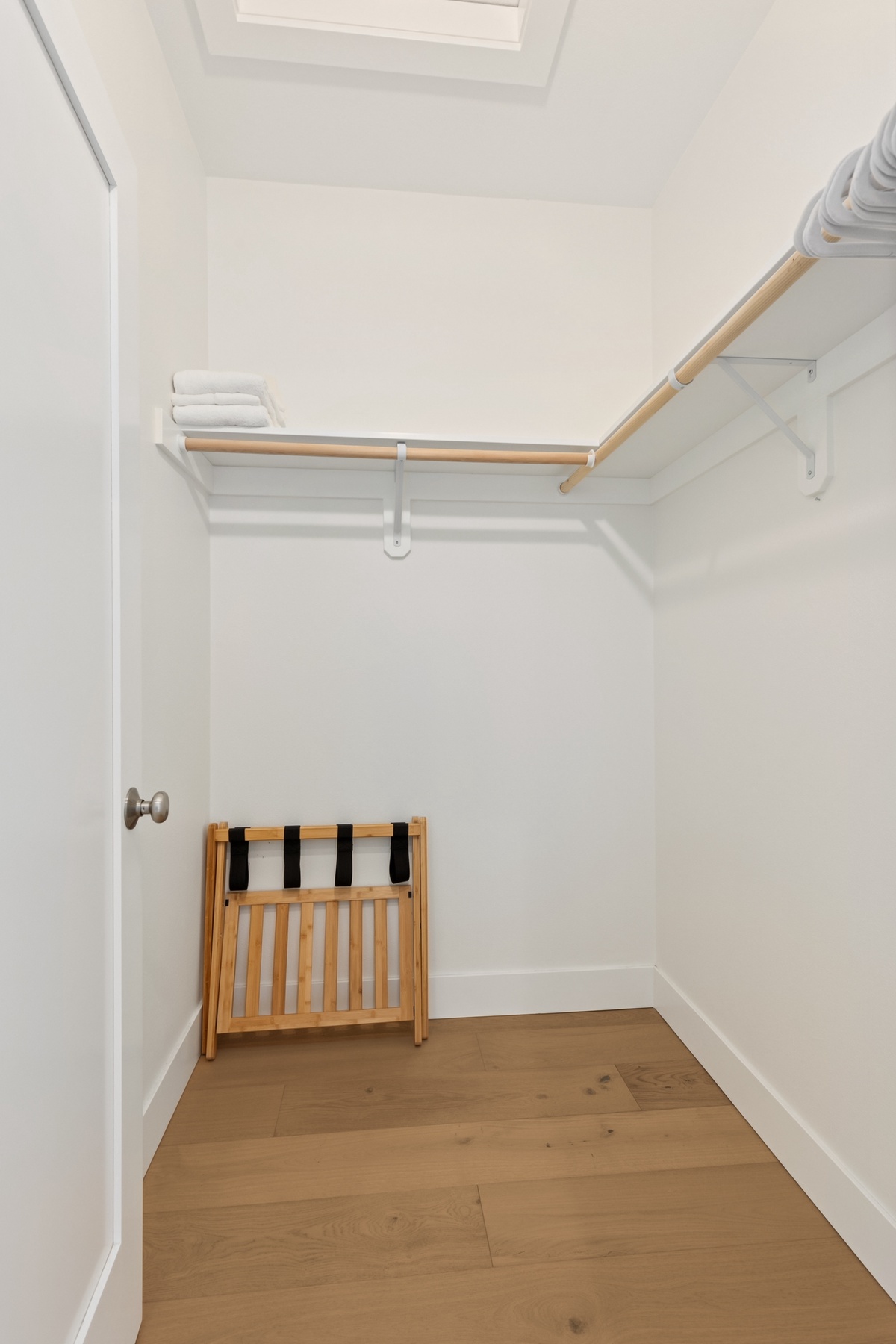 Walk in closet in primary room
