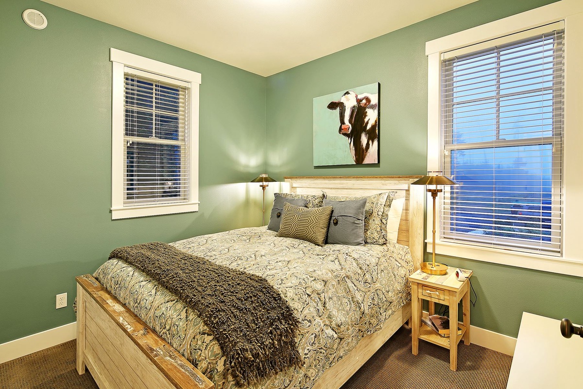 Second floor guest bedroom with queen bed