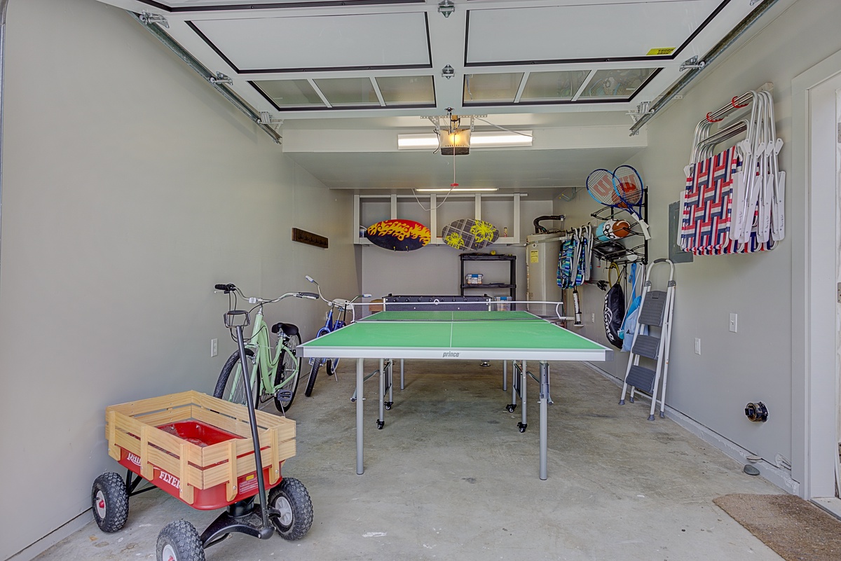 The garage is full of fun with a ping pong table and foosball as well as 2 bicycles