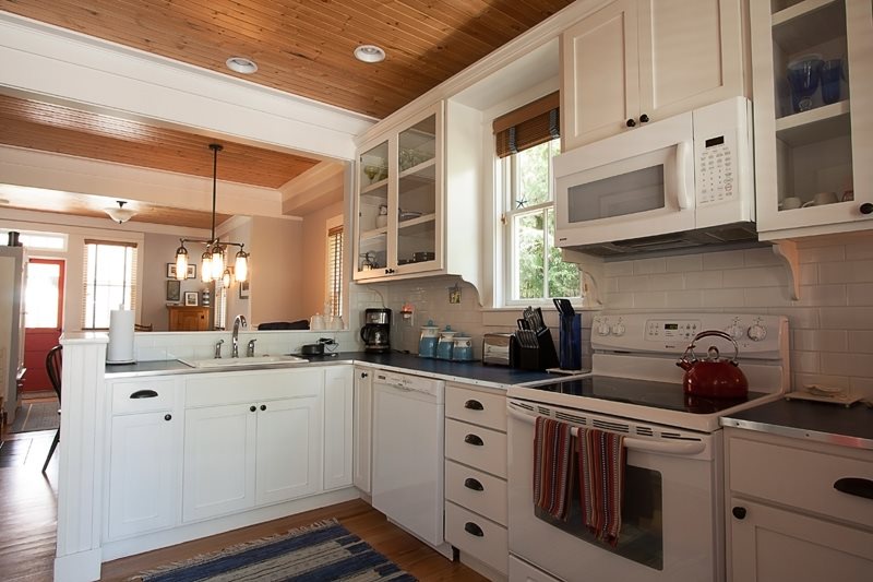 Gourmet kitchen with a rice cooker, food processor/blender, griddle, and copper bottom pans