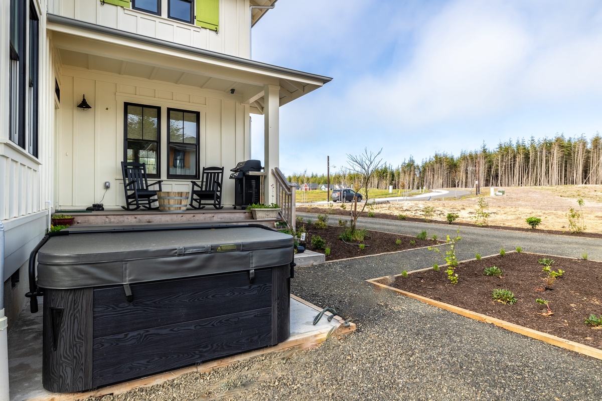 Relax your aches away in the private hot tub