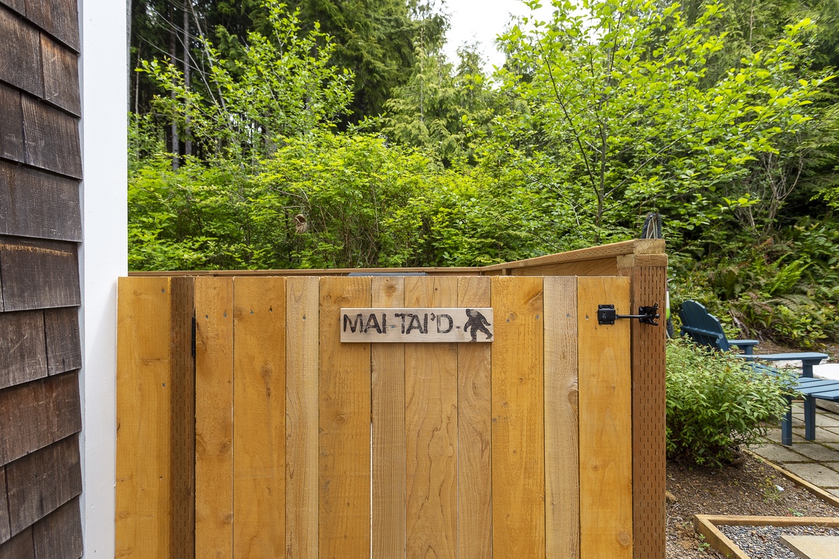 Private back patio with bbq hot tub and outdoor seating