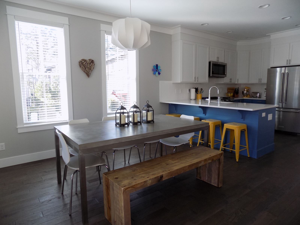 Table with seating for six and extra space at the breakfast bar