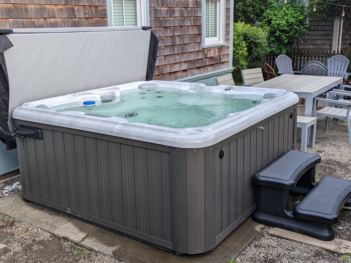 Relax and unwind in the private hot tub