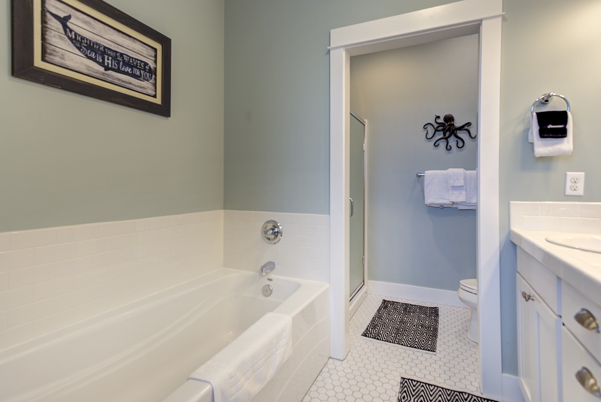 Relax in the primary bathroom bathtub