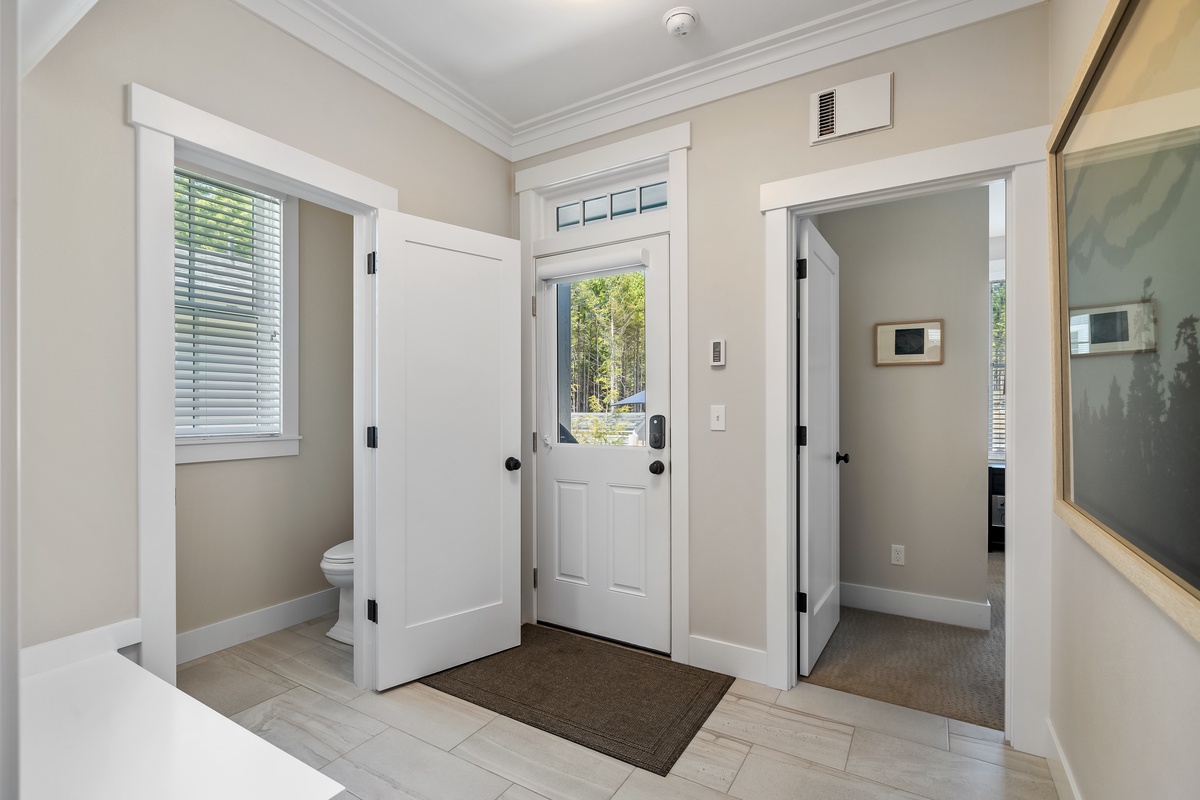 Half bath and primary bedroom access