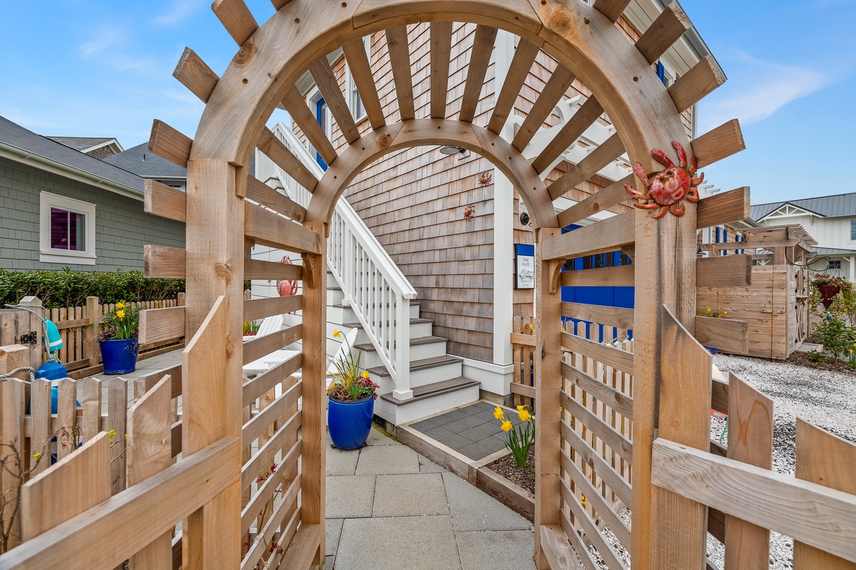 Walk through the arched gate to the courtyard