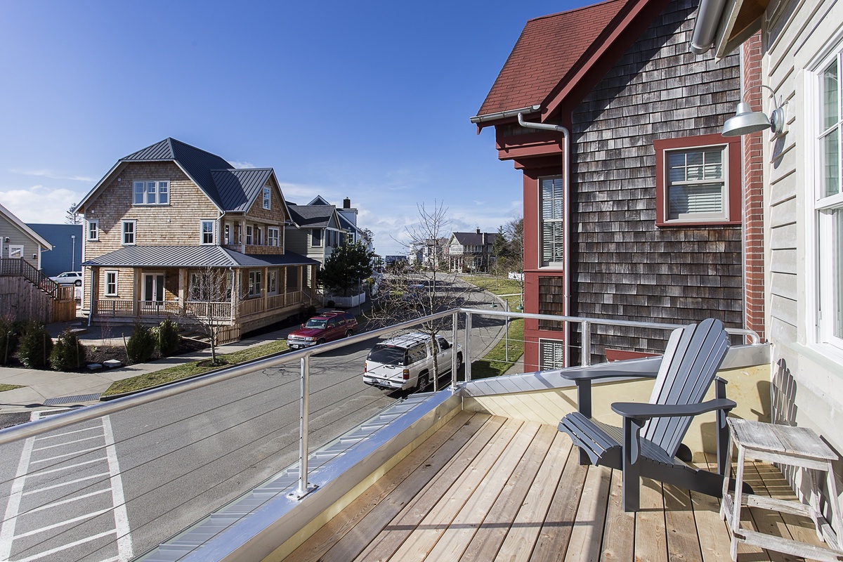 Take in the view from private balcony in primary king bedroom