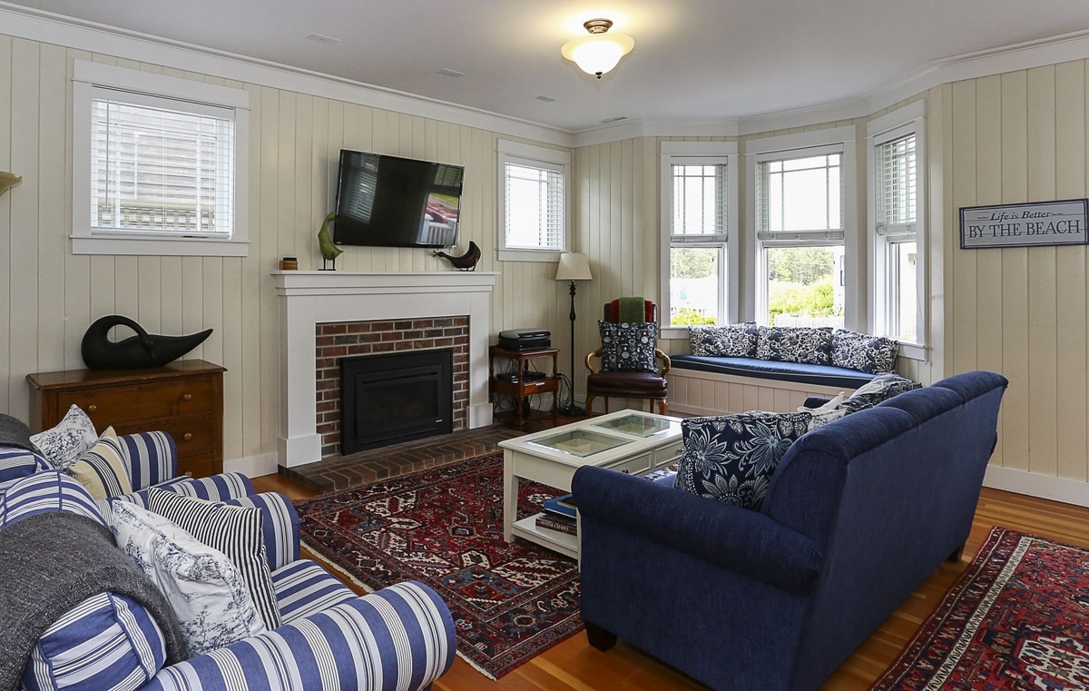 Enjoy the fireplace and watch your favorite shows in the living room