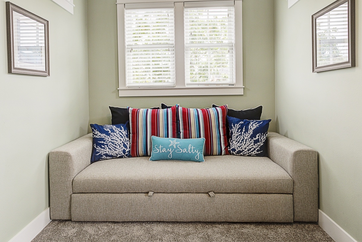 Daybed in primary bedroom converts to king sleeper if you need extra sleeping space