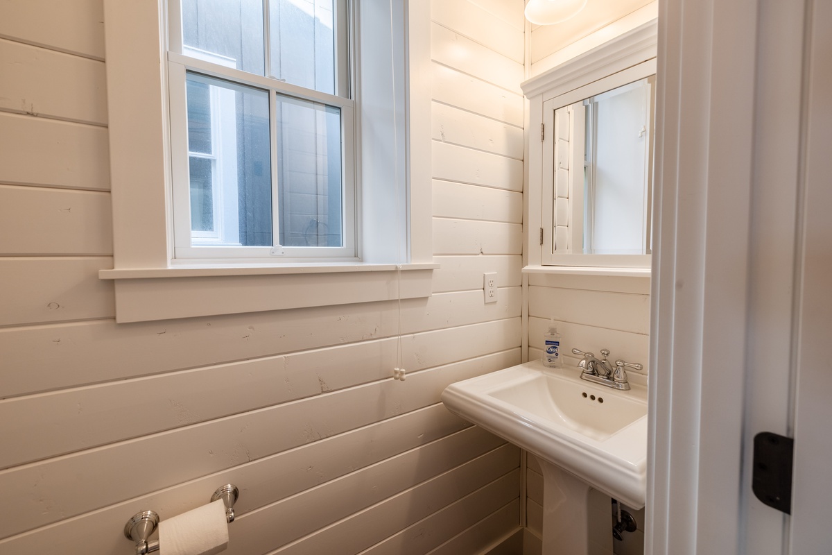 Half bath conveniently located off the mudroom