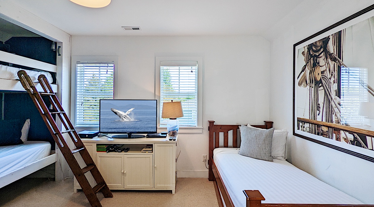 Bunk beds and twin bed on the third floor