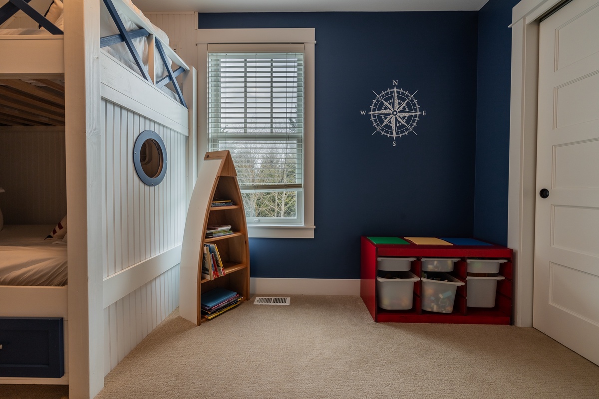 The bunk room's decor brings a touch of adventure to your stay