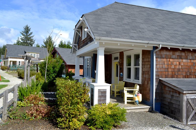 Covered porch is perfect for relaxing on a lazy afternoon