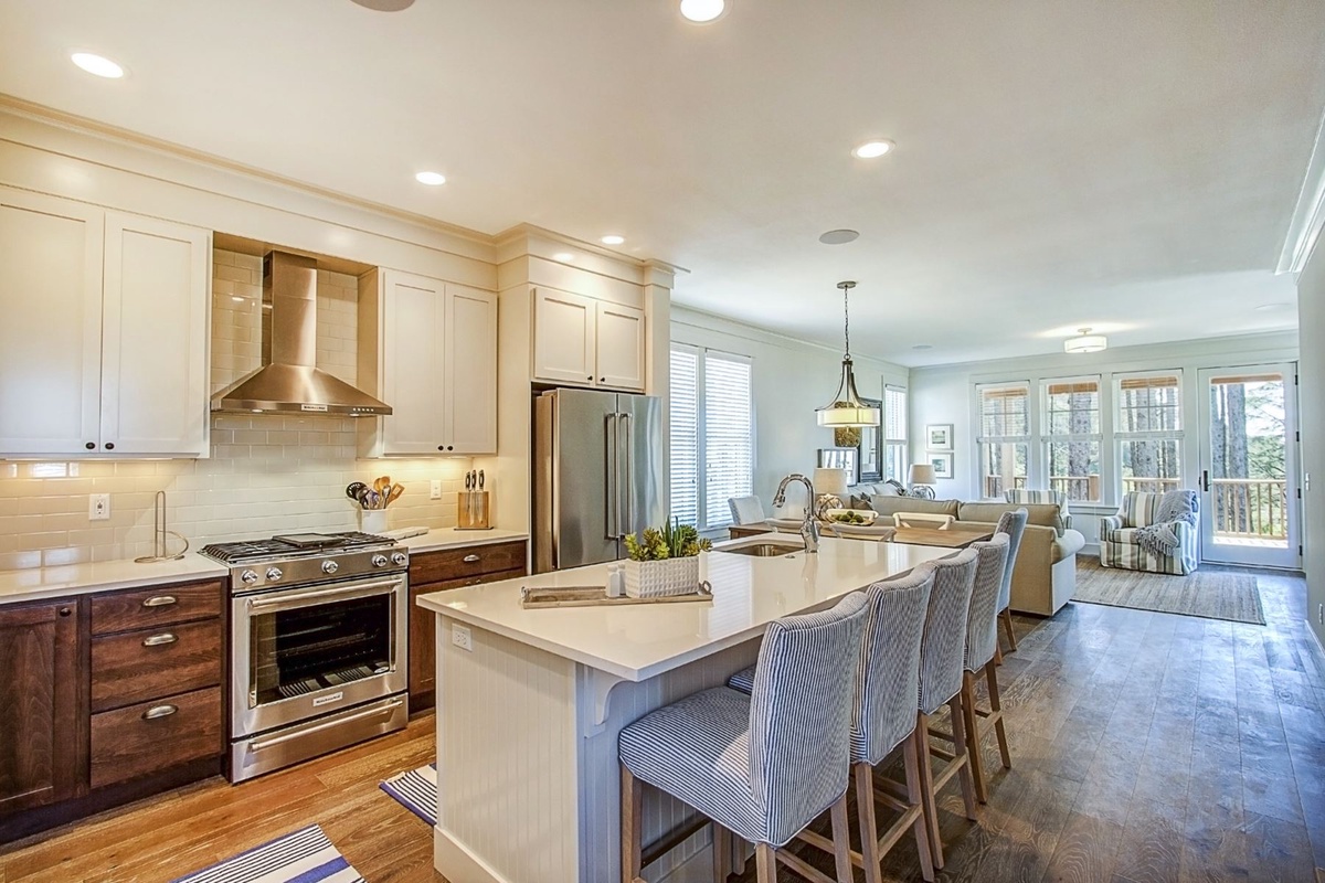 Beautiful kitchen with gas range and stainless steal appliances