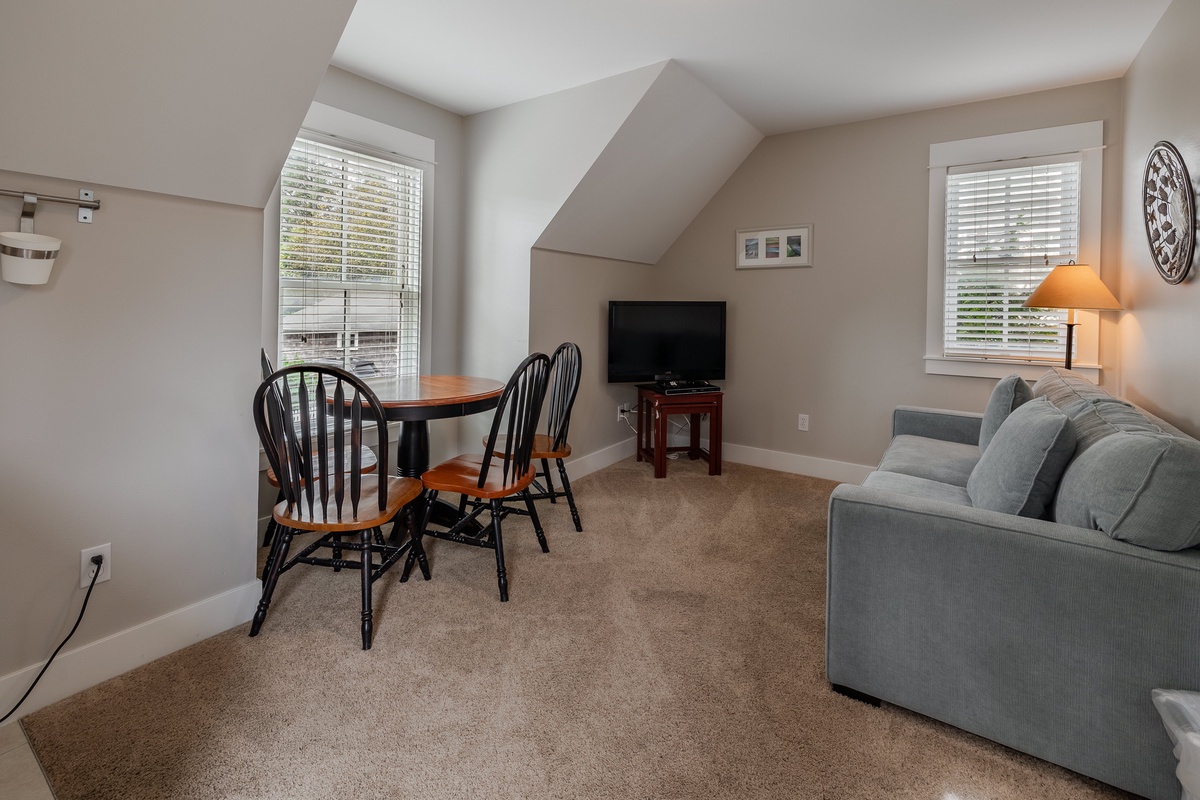 The carriage house living space offers comfort and convenience for a relaxing stay