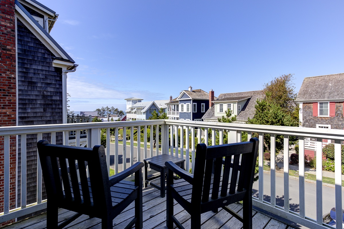 Watch the sun set over the ocean from the deck