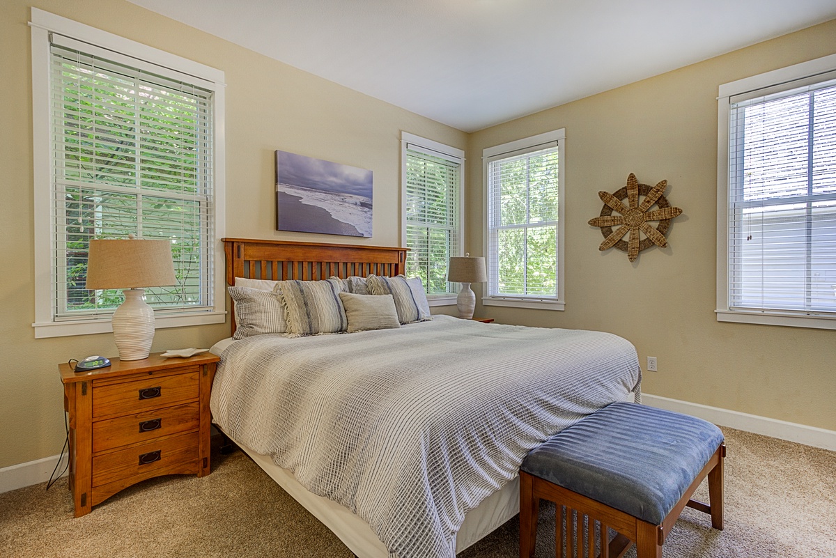 Main floor primary bedroom with private bathroom