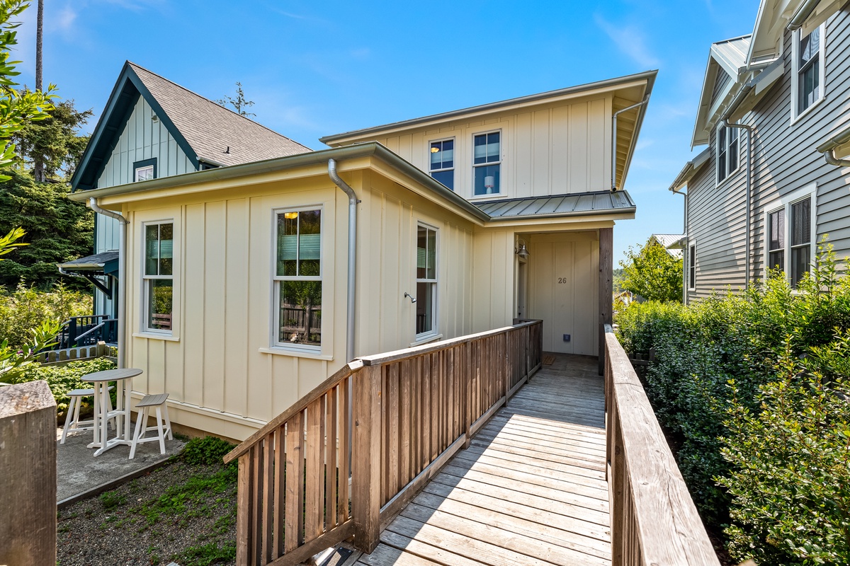 Wheelchair ramp from driveway to enter home's lower level