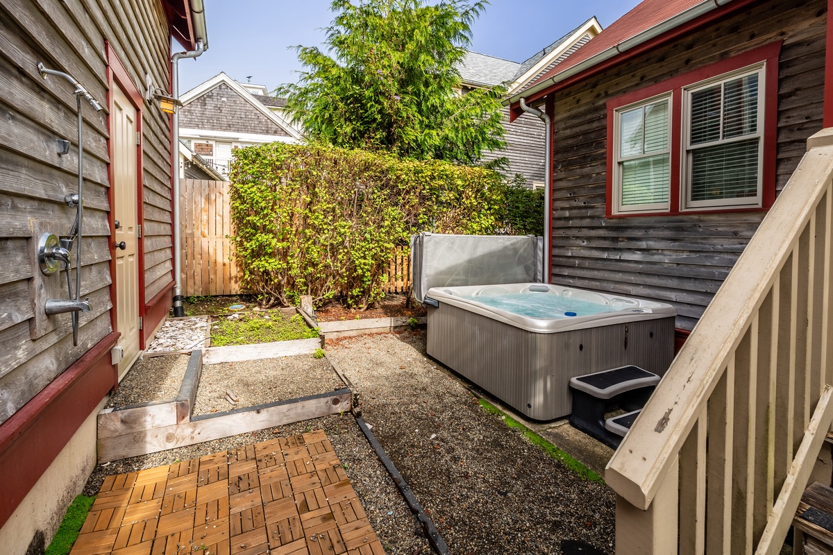 Unwind in the soothing hot tub and let the stress melt away