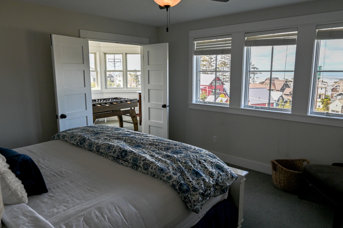 Primary bedroom with amazing views and pass-through to game room