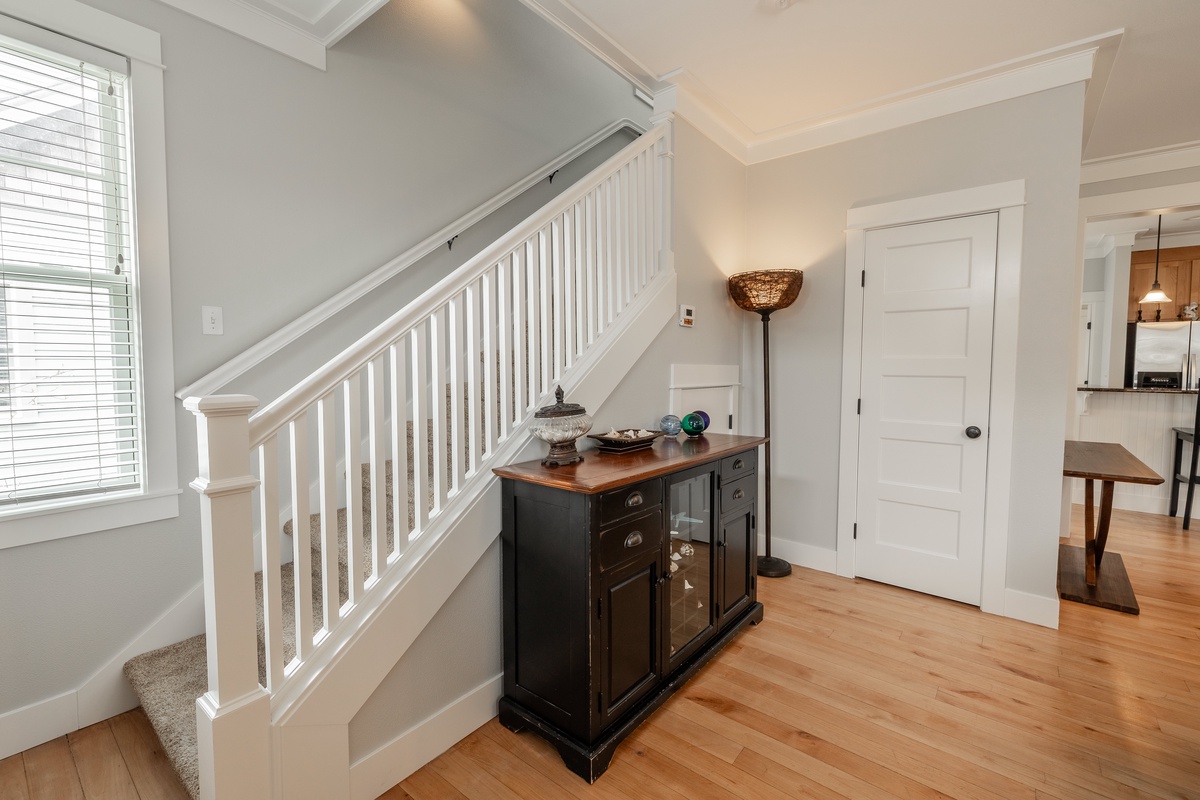 Stairs up to additional bedrooms