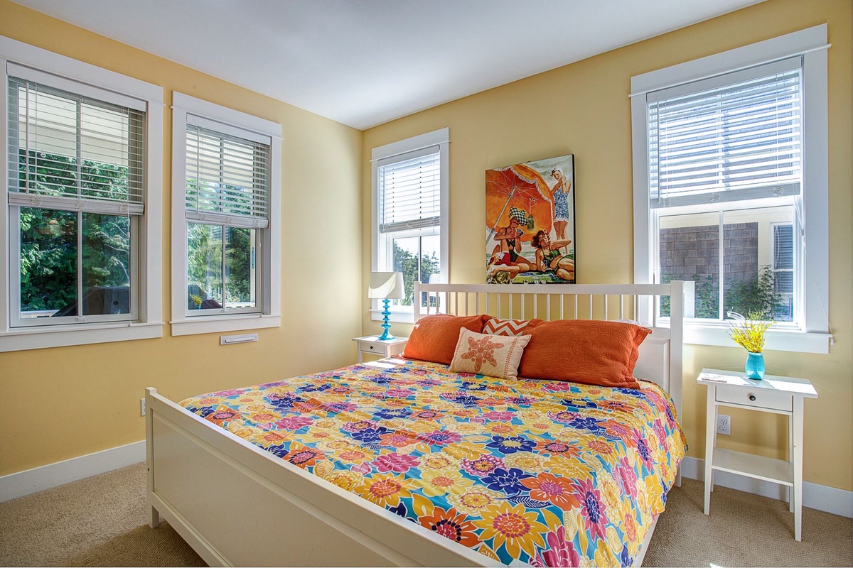 Main floor primary king bedroom is perfect for a restful night's sleep