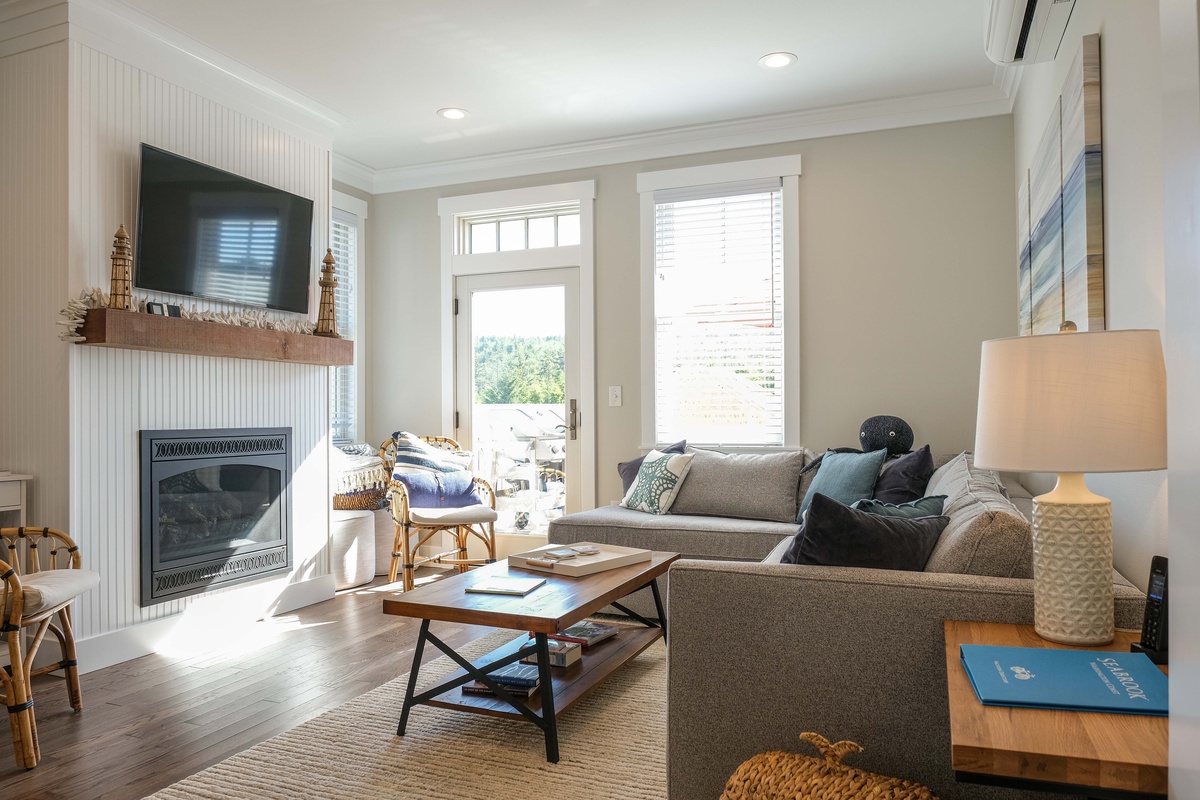 The living room leads out to the deck